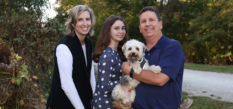 photo of family and their dog